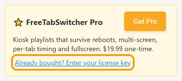 The Pro card in the FreeTabSwitcher popup, with the 'Already bought? Enter your license key' link highlighted